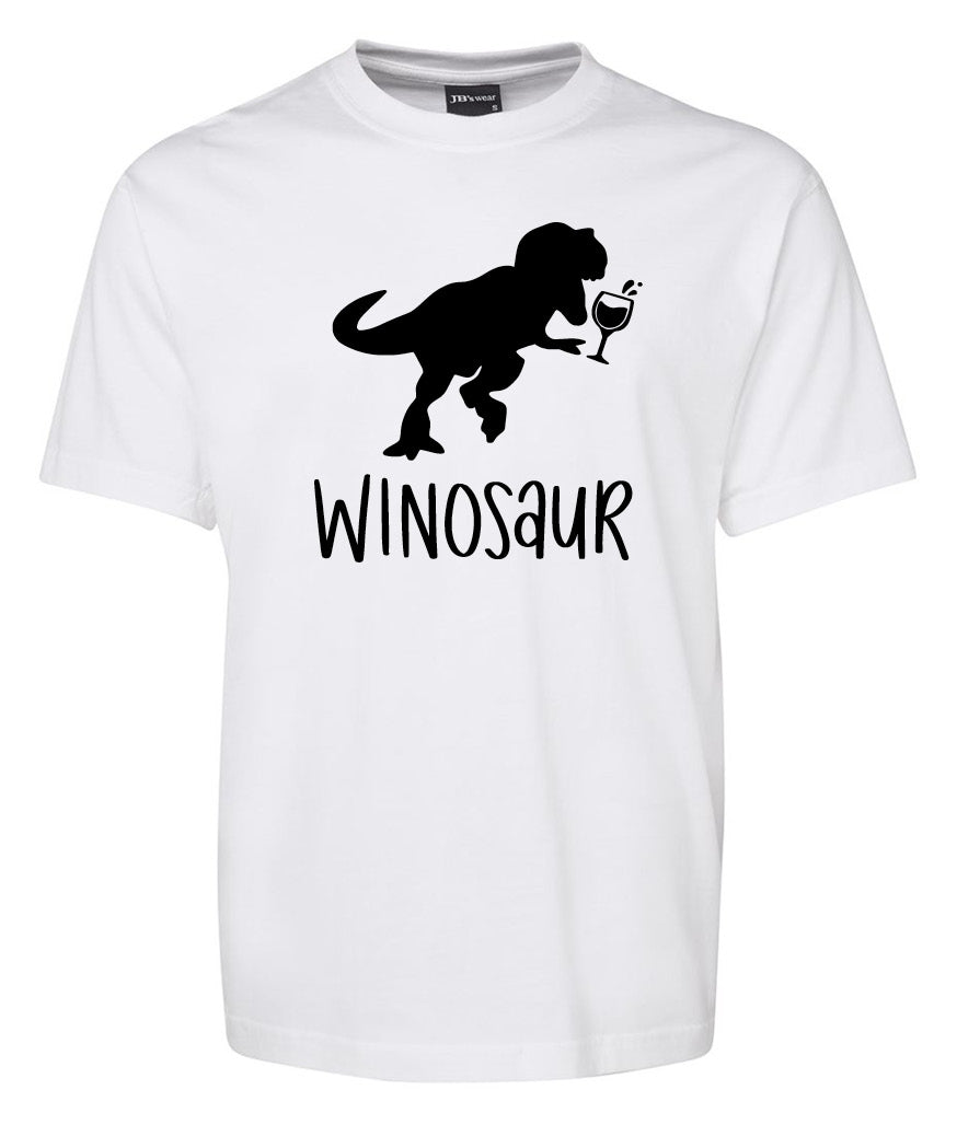 The WINOSAUR glass Shirt by Corsa Clothing features a white tee with a black T-rex holding a wine glass above the word "WINOSAUR" in playful font.