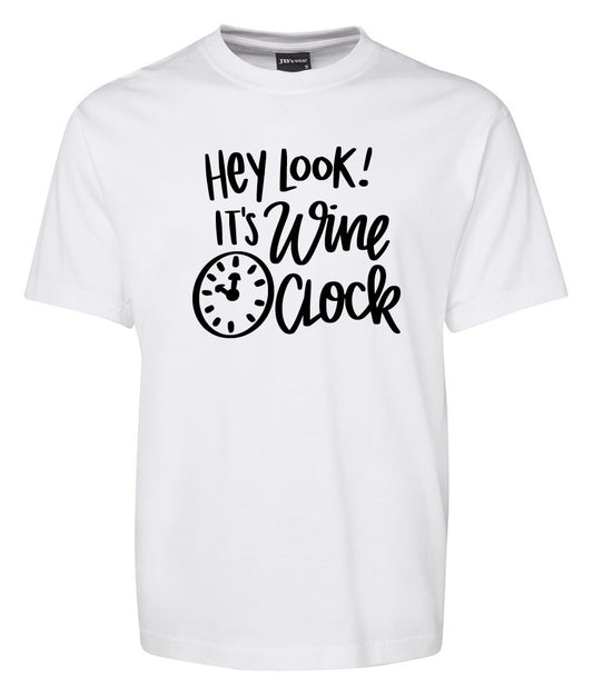 The Corsa Clothing Hey Loot It’s Wine Clock Shirt is a white tee with black text—"Hey look! It’s wine o’clock"—and a small clock graphic set to 5 o’clock.