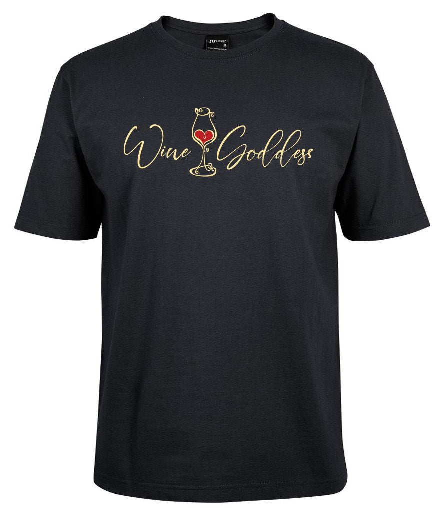The Wine & Goddess Shirt by Corsa Clothing is a black tee with "Wine Goddess" in gold script, a wine glass forming the letter "i," and a red heart inside the glass.