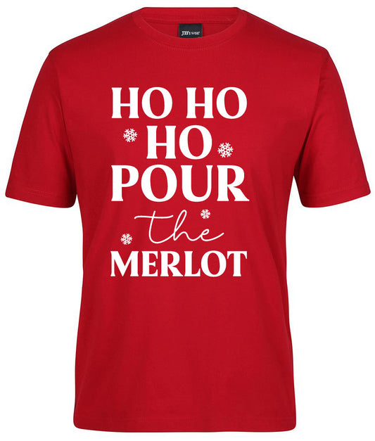 The HO HO HO Pour the Merlot shirt by Corsa Clothing is a red tee with large white “HO HO HO POUR the MERLOT” lettering and small snowflake accents.