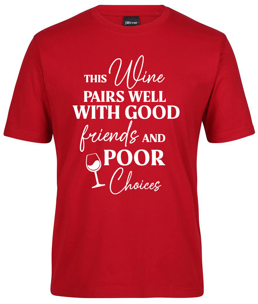 The Pairs Well Good Friends Shirt by Corsa Clothing is a red tee featuring white text—“This wine pairs well with good friends and poor choices”—and includes a small wine glass illustration next to “poor.”.