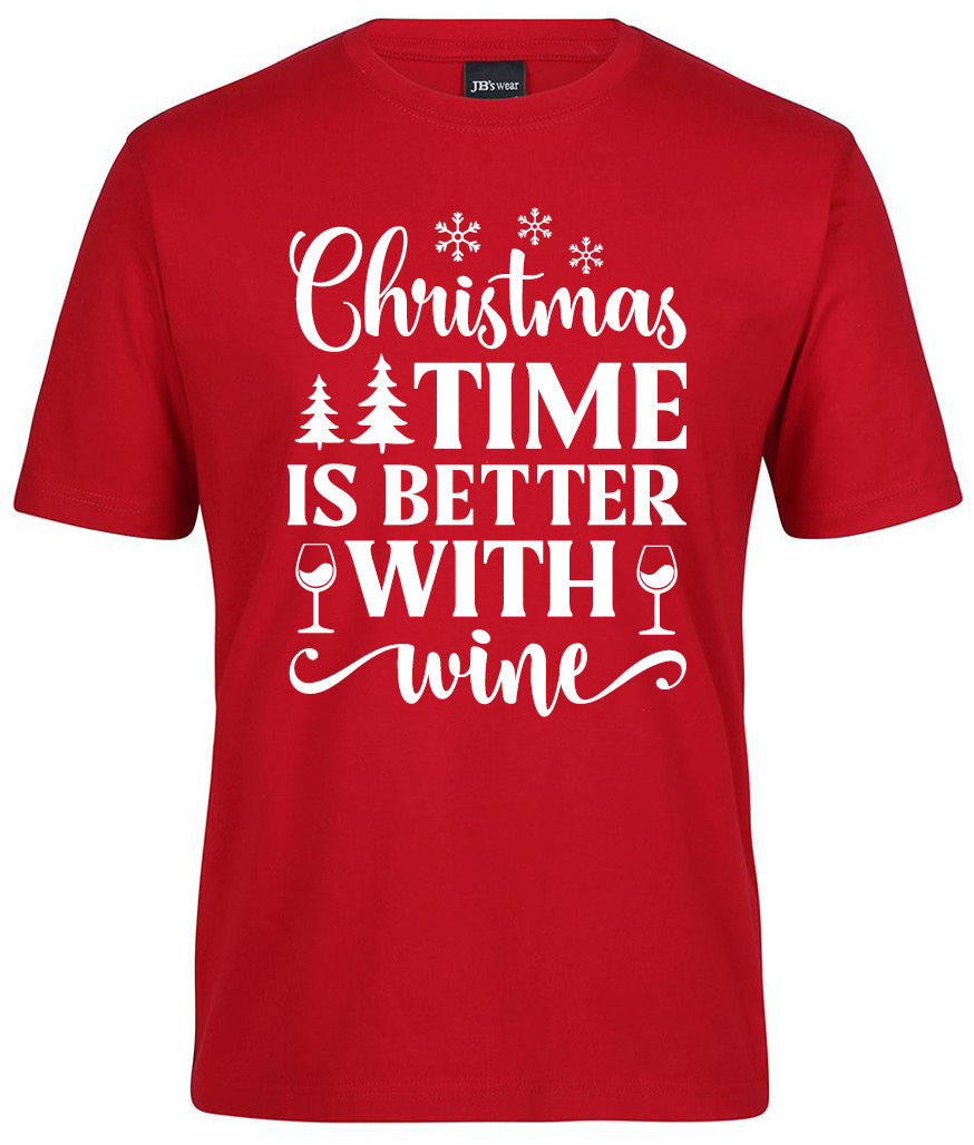 The Corsa Clothing "Christmas time is better with Wine Shirt" is a red tee featuring white text, snowflakes, Christmas trees, and wine glass designs.