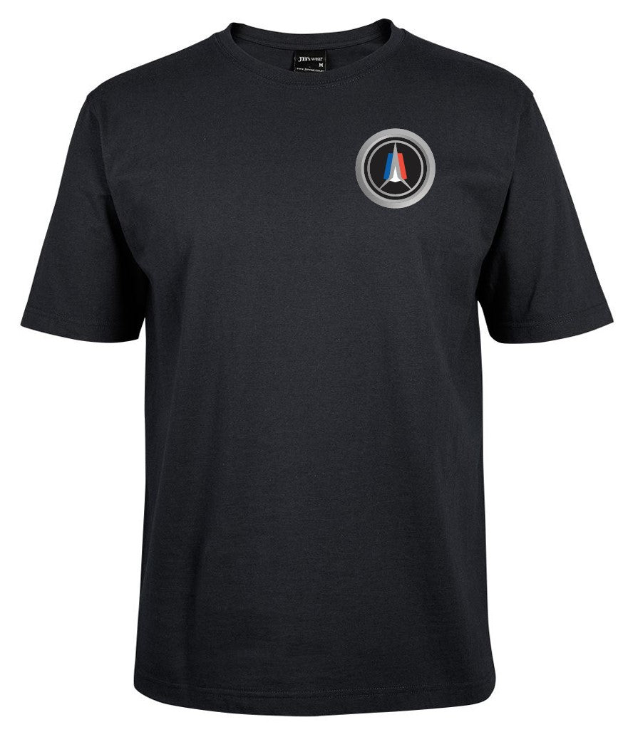 The Corsa Clothing Valiant Round Chrome is a black crew neck short-sleeve t-shirt with a circular chrome logo in blue, red, and white on the left chest and a plain background.