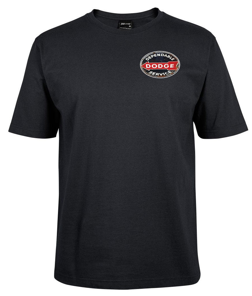 The Dodge Service Pocket T-shirt by Corsa Clothing is black with a small round red, white, and black Dodge Dependable Service logo on the left chest. It features a crew neck and short sleeves.