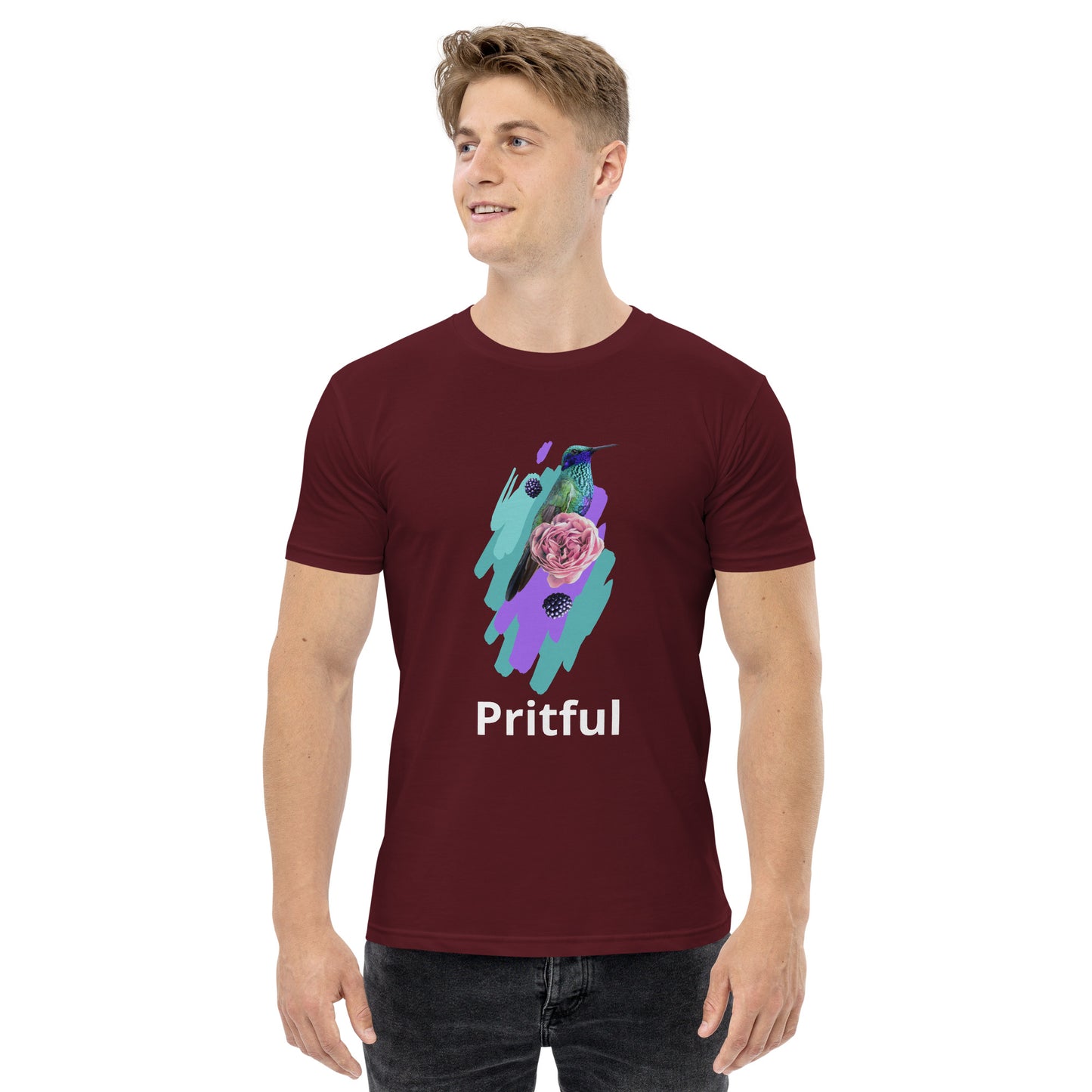 Smiling man wears Corsa Clothing's men's staple tee, a maroon cotton shirt with an abstract hummingbird, pink rose, purple brush strokes, and "Pritful" text—ideal for Australia and New Zealand style.