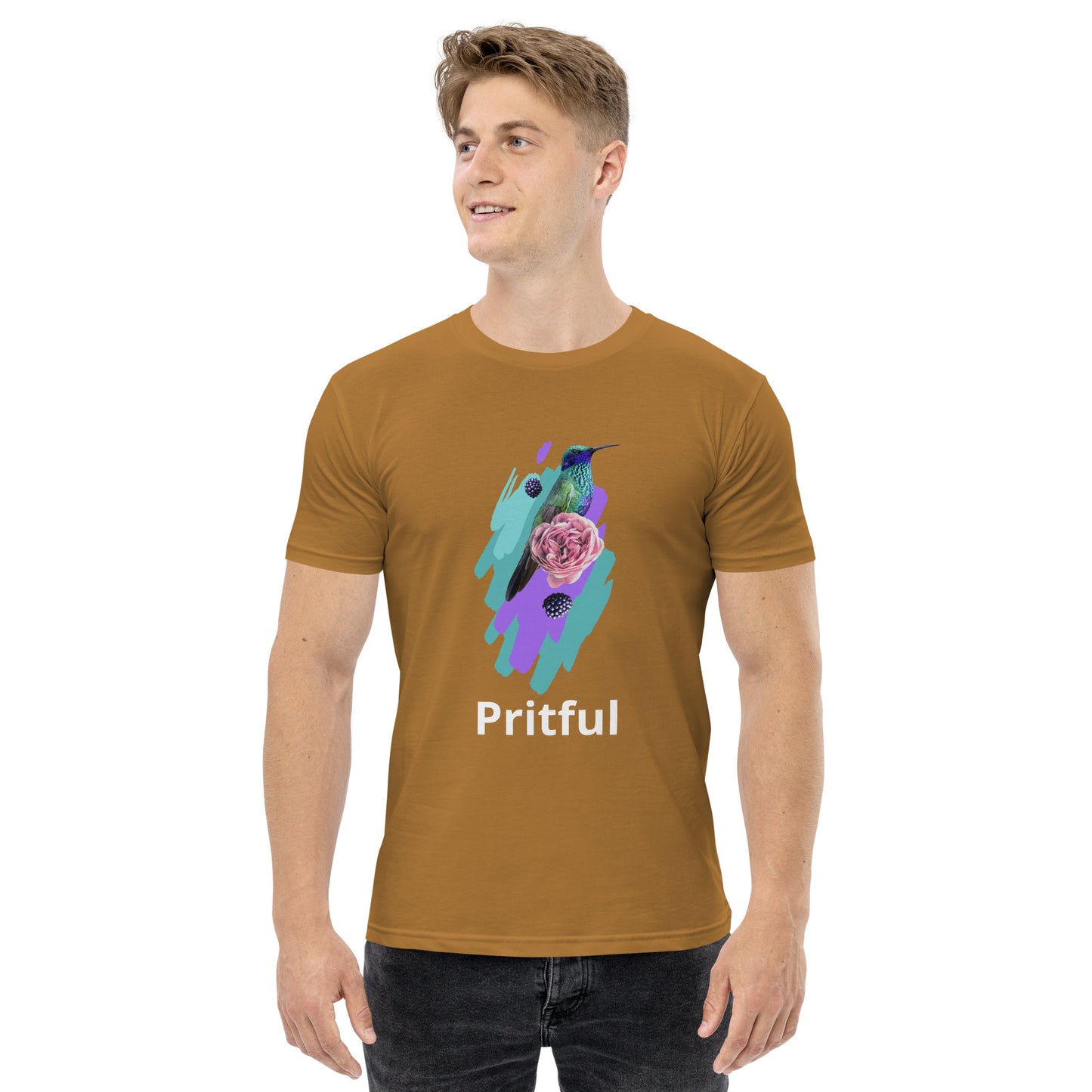 A smiling man wears the Corsa Clothing Men’s staple tee with a colorful hummingbird, pink flower, and purple brushstrokes graphic plus "Pritful" text—a perfect wardrobe essential in Australia and New Zealand.