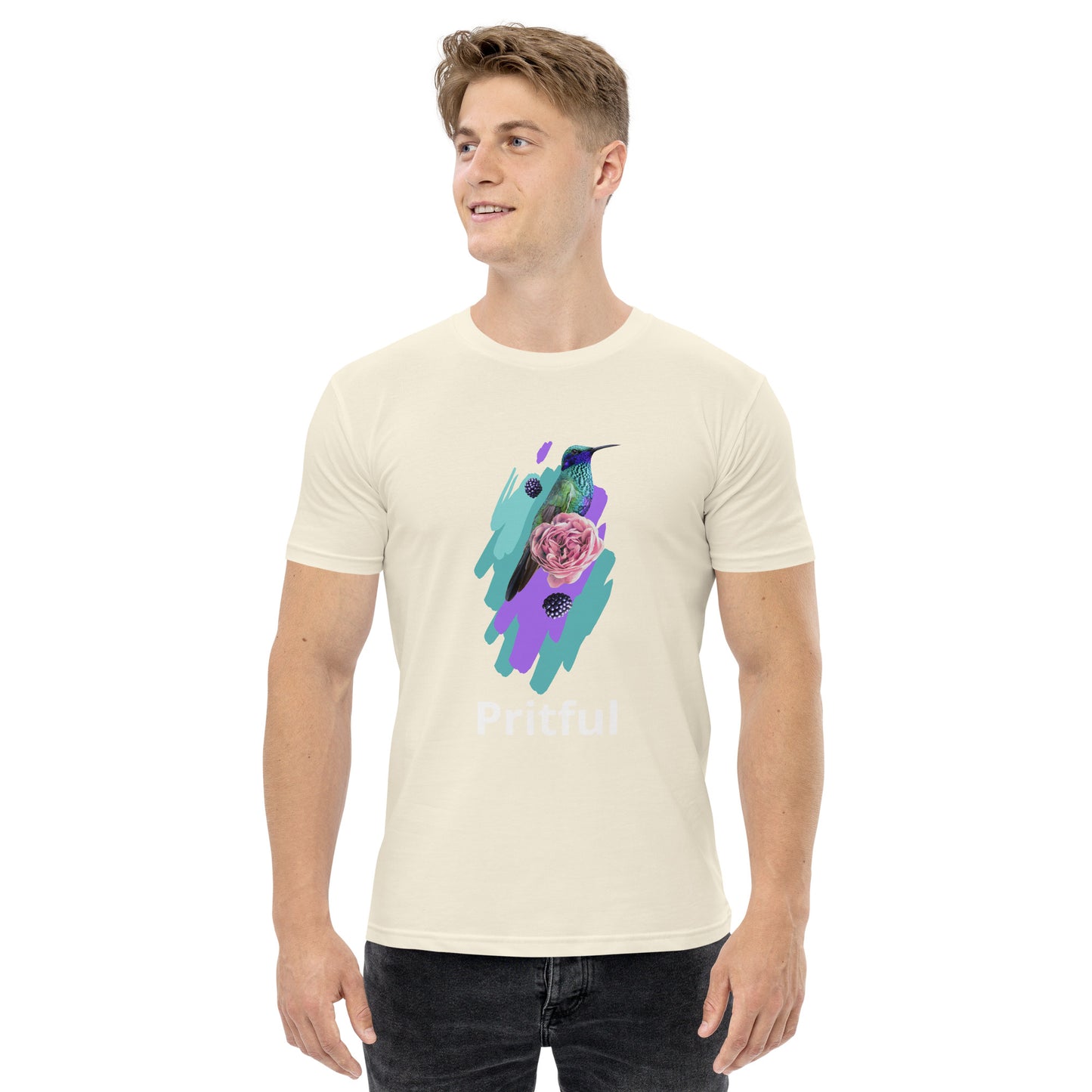 A smiling man wears the Men's Staple Tee by Corsa Clothing, featuring a colorful hummingbird and pink rose on an abstract purple and teal background with "Pritful" below—perfect cotton style for Australia and New Zealand lovers.