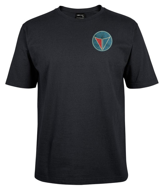 The Corsa Clothing Valiant round blue/red pocket is a black short-sleeve t-shirt with a small, circular blue and red geometric logo on the left chest.